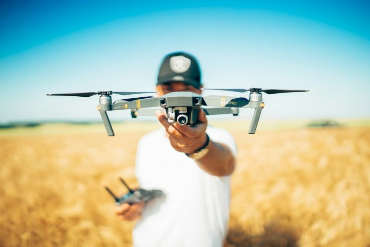 Drone - shallow focus photography of quadcopter