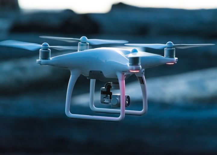 Drone - photo of white flying quadcopter