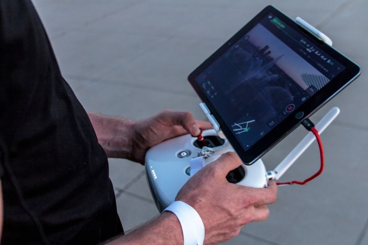 Drone - person holding quadcopter controller