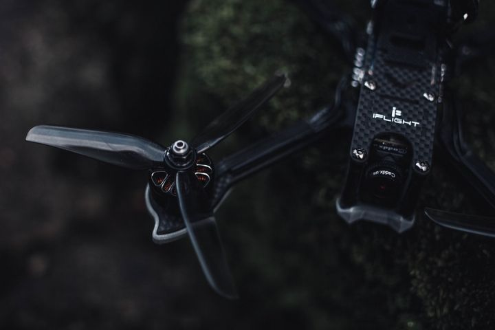 FPV - selective focus photography of black drone copter