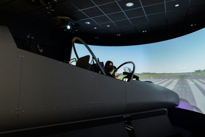 Flight Simulator - man in black jacket riding black convertible car