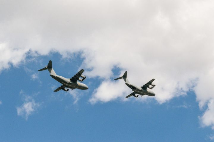 Flight Training - two white planes flying