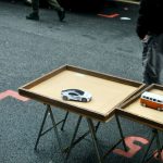 Radio-Controlled - brown wooden table on gray carpet