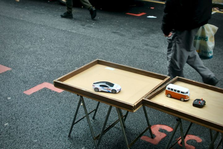 Radio-Controlled - brown wooden table on gray carpet