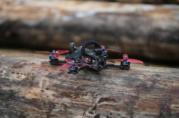 Fpv - a toy car on a wood surface