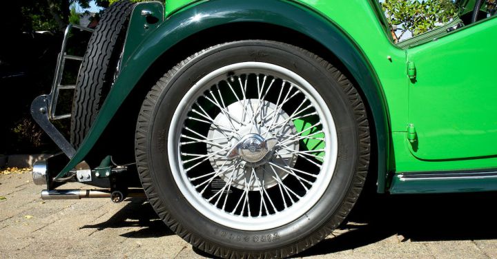 Convert - Green and Silver Car on Gray Asphalt Road